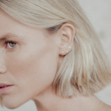 The Curve Gold Studs