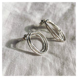 Asymmetric Knot Studs