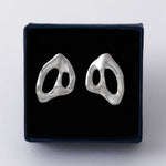 KEYES-spaced-earrings-Space-ghost-sculptural-hammered-handmade-statement-cut-out-stud-earrings-design-cool-unique-jewellery-demifine-independent-london