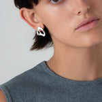 KEYES-spaced-earrings-Space-ghost-sculptural-hammered-handmade-statement-cut-out-stud-earrings-design-cool-unique-jewellery-demifine-independent-london2