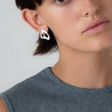 KEYES-spaced-earrings-Space-ghost-sculptural-hammered-handmade-statement-cut-out-stud-earrings-design-cool-unique-jewellery-demifine-independent-london2