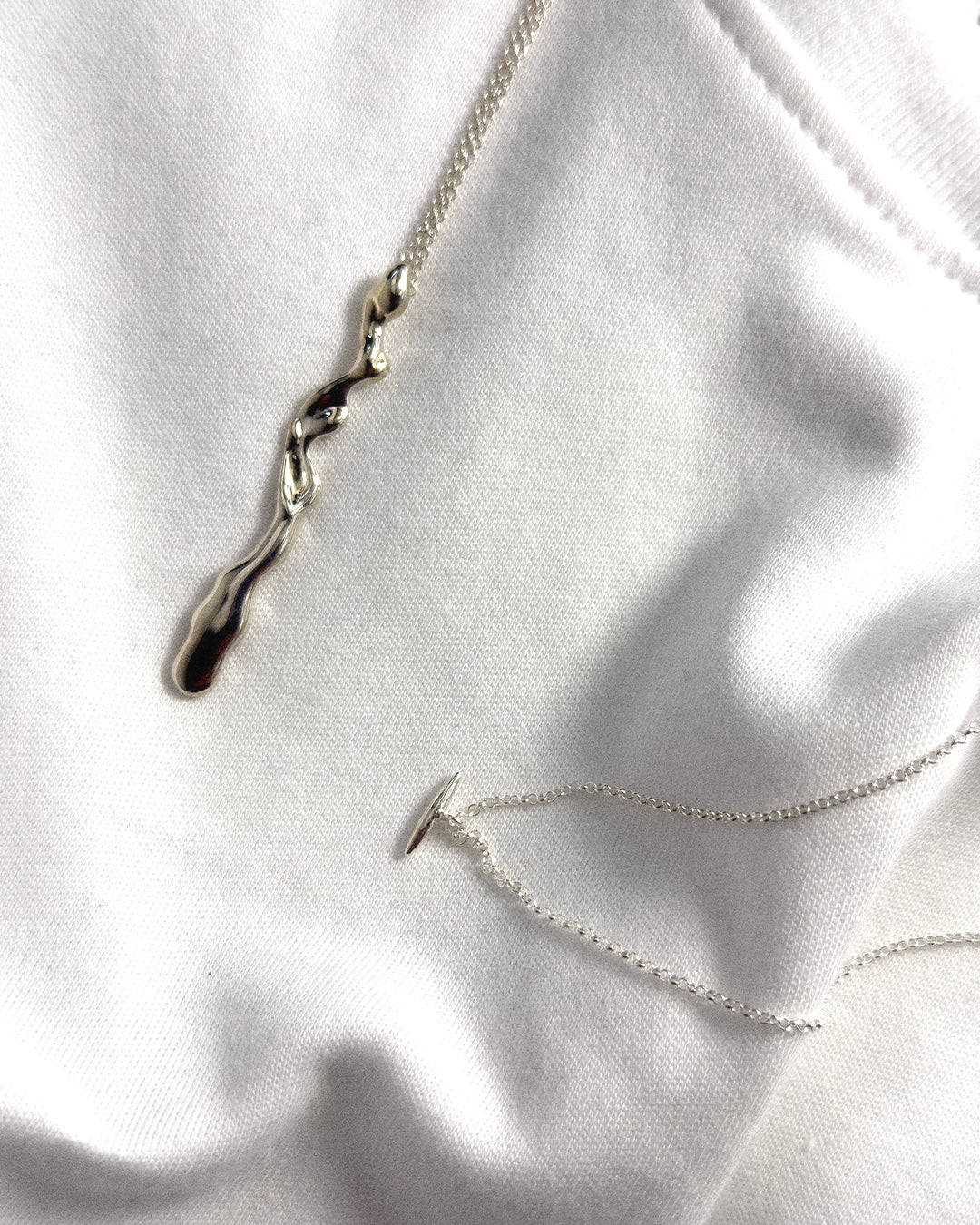 Liz-Crow-London-Resilience-Necklace-Sterling-Silver-Wiggle-Pcean-Drop-Wave-Long-Statement-Pendant-Molten-Texture-Necklace3