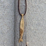 Milly-Maunder-Chunky-Fish-Pendant-Long-Necklace-Coastal-Marine-Motifs-Jewellery-Beach-Summer-Pendant-Sealife-Ocean-Textured-Cool-Pisces-Gold-Plated-Rope-Cord-Brown-Layering-Necklace-Summer-2026-Jewellery-Trends