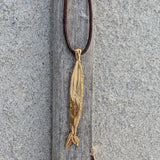 Milly-Maunder-Chunky-Fish-Pendant-Long-Necklace-Coastal-Marine-Motifs-Jewellery-Beach-Summer-Pendant-Sealife-Ocean-Textured-Cool-Pisces-Gold-Plated-Rope-Cord-Brown-Layering-Necklace-Summer-2026-Jewellery-Trends