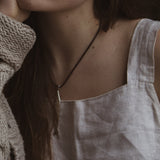 Milly-Maunder-Chunky-Fish-Pendant-Long-Necklace-Coastal-Marine-Motifs-Jewellery-Beach-Summer-Pendant-Sealife-Ocean-Textured-Cool-Pisces-Gold-Plated-Rope-Cord-Brown-Layering-Necklace-Summer-2026-Jewellery-Trends