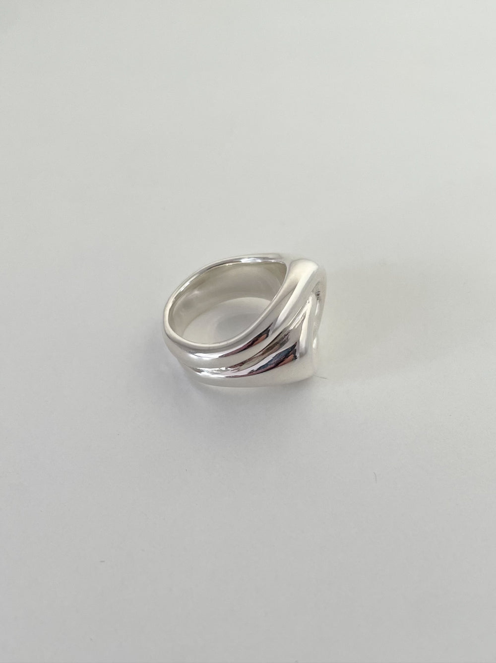 Ruddock-Ravel-riley-statement-cocktail-oversized-ring-fluid-interwoven-bold-chunky-pinky-signet-ring-sculptural-twist-sterling-Silver-demifine-contemporary-jewellery-golden