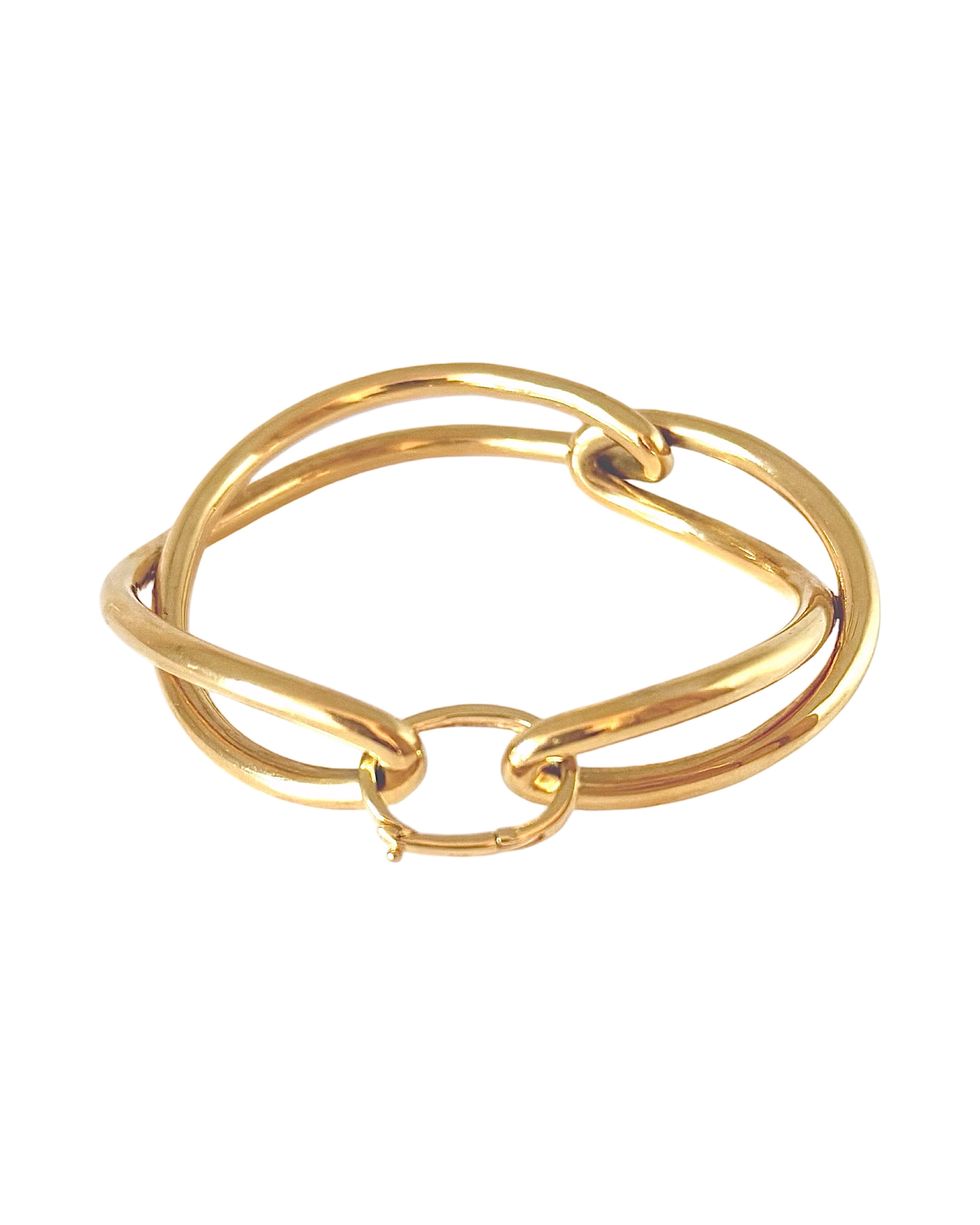Ruddock-Soma-Bangle-Cuff-Interlocking-Interwoven-Tublar-Scultpural-twisted-clean-lines-forms-modern-statement-bracelet-Sleek-minimal-cool-jewellery-demifine-gold-plated-18ct