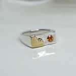 Tilly-Sudsbury-signet-ring-with-a-twist-orange-citrine-gemstone-rectangle-chunky-ring-statement-mixed-metal-gold-sterling-silver