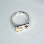 Tilly-Sudsbury-signet-ring-with-a-twist-orange-citrine-gemstone-rectangle-chunky-ring-statement-mixed-metal-gold-sterling-silver