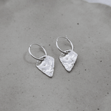Milly-Maunder-Arma-Shield-Pendant-Drop-Huggies-Hoop-Earring-Textured-Pendant-Sterling-Silver-Silver-Stacking