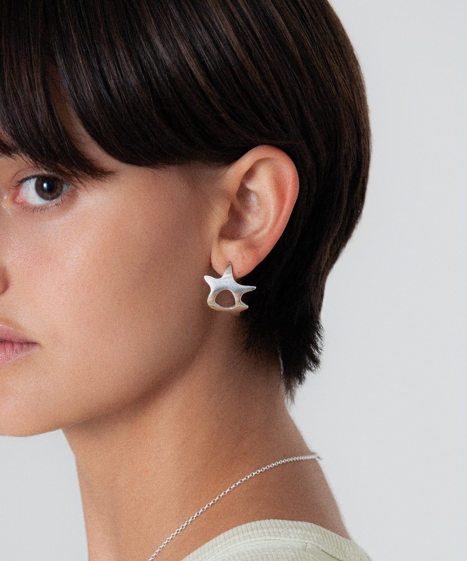 arp-earrings-Keyes-sterling-silver-star-wonky-sculptrual-cut-out-statement-earrings-stud-hole-spike-cool-effortless-design--GOLDEN-ShopGolden.co-Demifine-Jewellery-Destination-Contemporary-Curated-UK-Brands