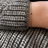 Gold black diamond bracelet
