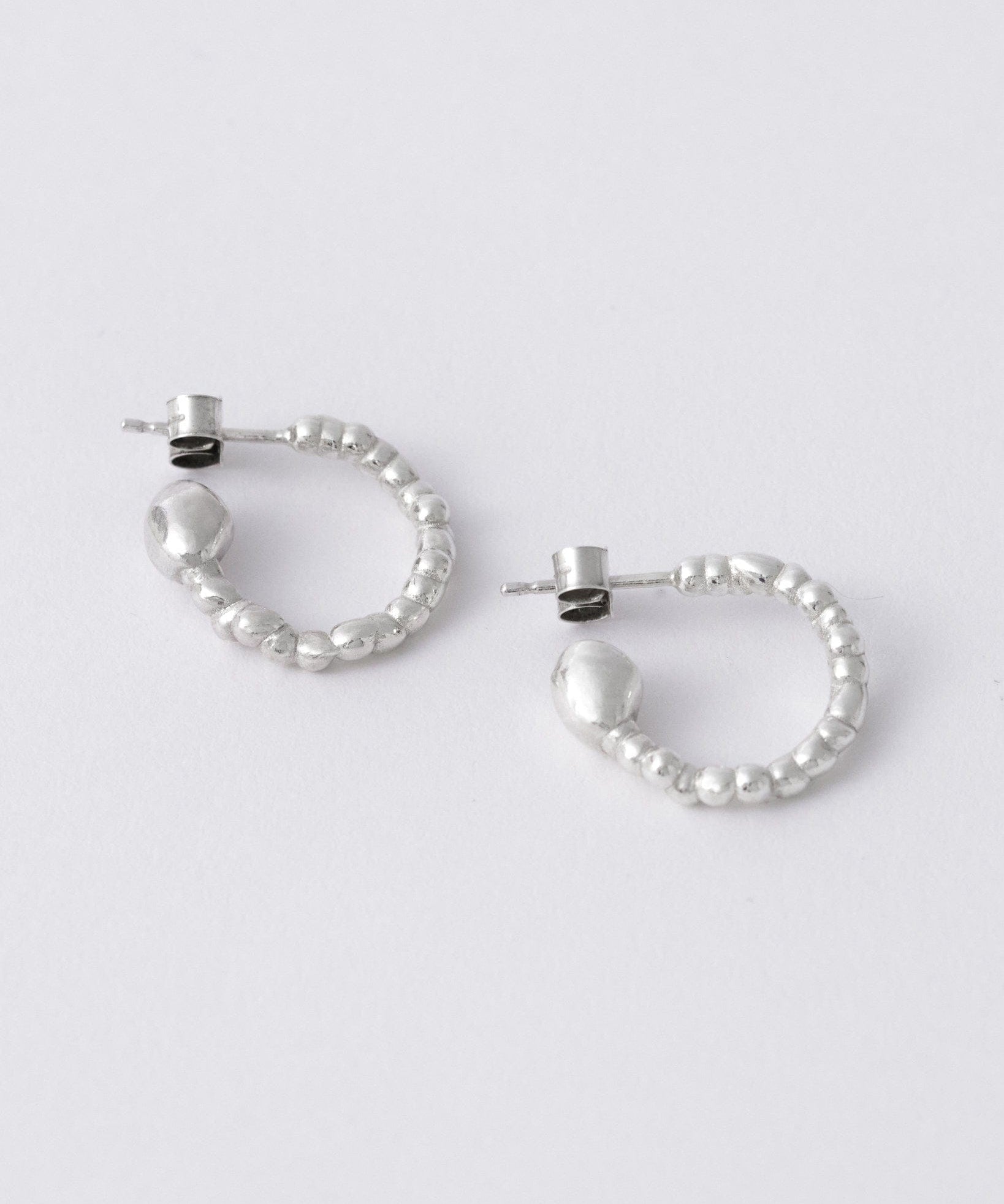 bubble-hoop-earrings-KEYES-sculptural-orb-sphere-bold-chunky-sterling-silver-hoops-handmade-london-Golden-Shopgolden.co-UK-DemiFine-Jewellery-Brands