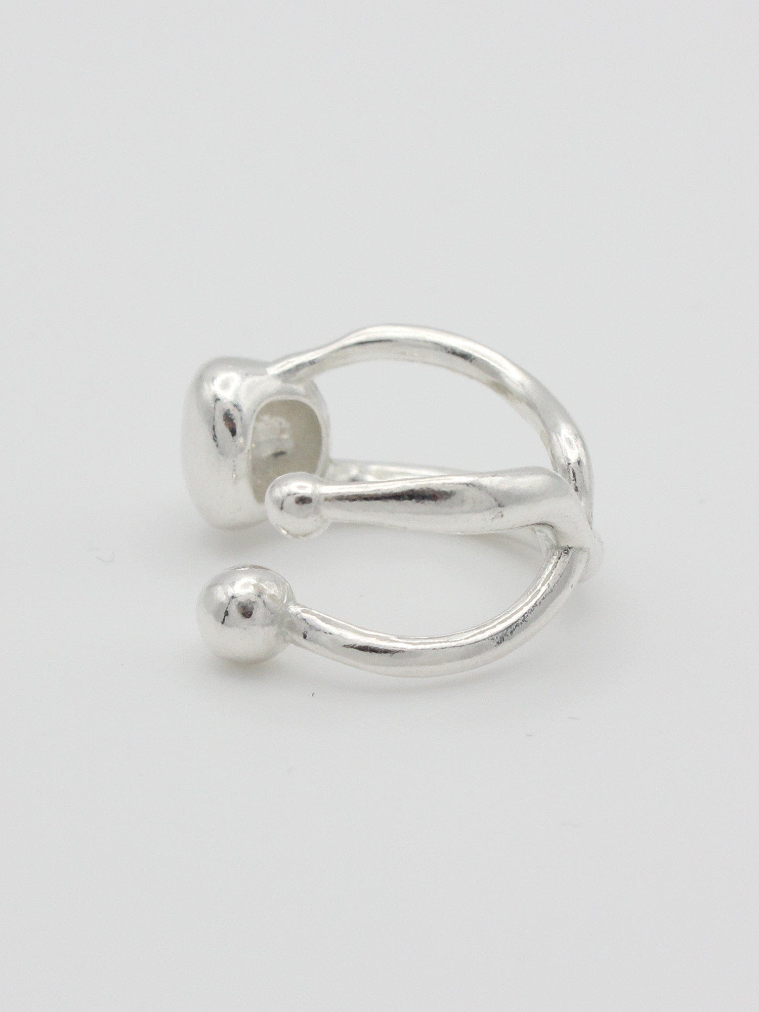 floater-ring-keyes-delicate-sculptural-design-bubble-sphere-open-wide-statement-chunky-shape-movement-understated-cool-sterling-silver-handmade-london-stacking-band--GOLDEN-ShopGolden.co-Demifine-Jewellery-Destination-Contemporary-Curated