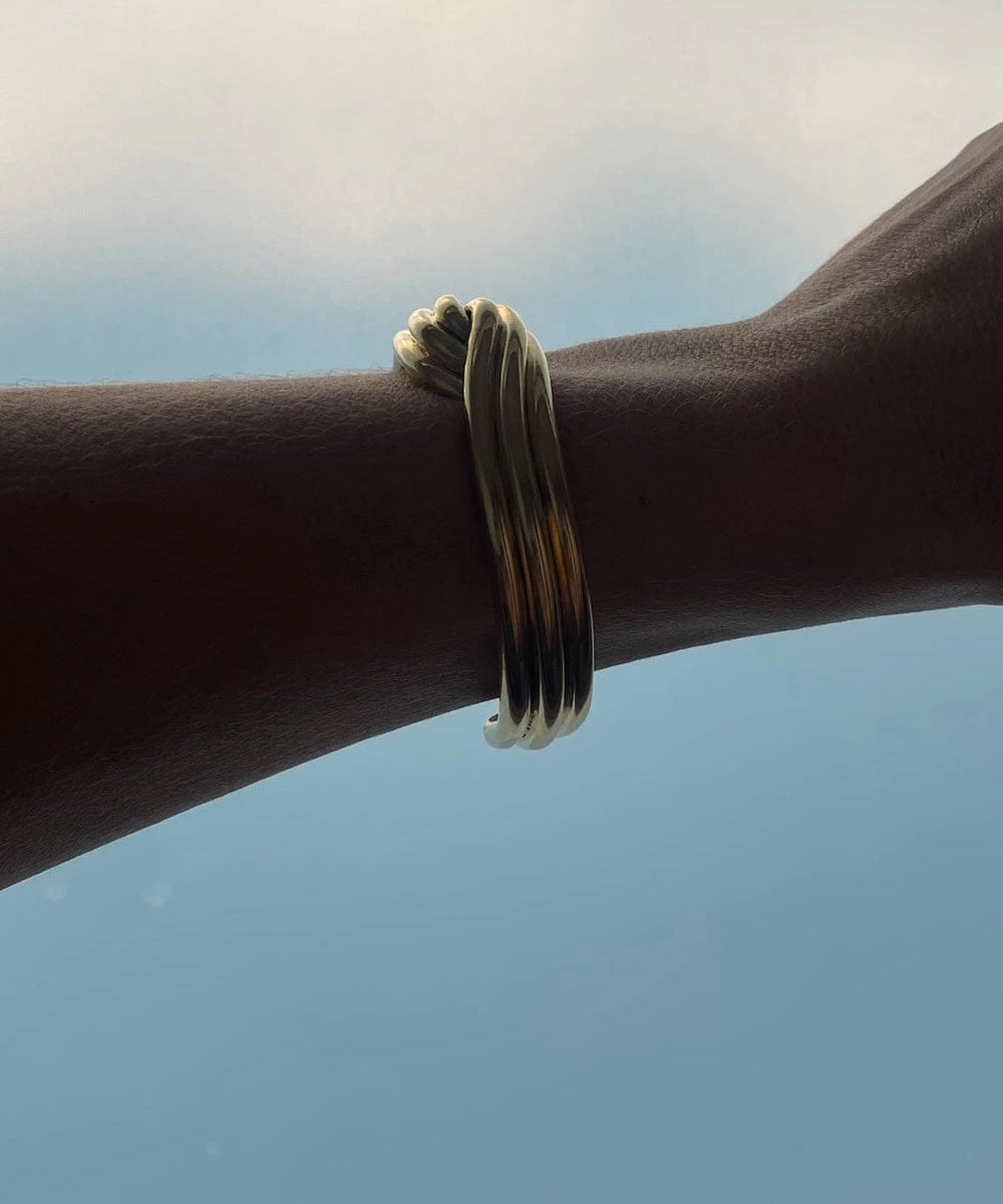 Ruddock-Gia-Cuff-Gold-Clean-Lines-Sleek-Minimial-Twisted-Tubular-Lunear-Fluid-Forms-Sculptural-Bangle-Bracelet-Cuff-Chunky-Cool-Jewellery-Gold-Plated