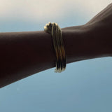 Ruddock-Gia-Cuff-Gold-Clean-Lines-Sleek-Minimial-Twisted-Tubular-Lunear-Fluid-Forms-Sculptural-Bangle-Bracelet-Cuff-Chunky-Cool-Jewellery-Gold-Plated