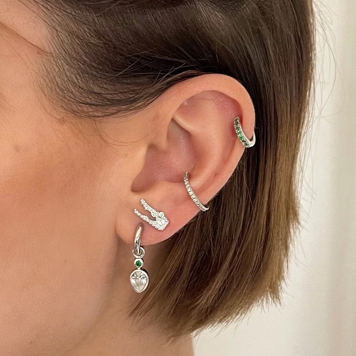 scream-pretty-gold-plated-huggie-hoop-earrings-with-green-diamond-cubic-zirconia-stones-gemstones-sparkly-ear-stack-stacking-earrings-cool-demifine-jewellery-contemporary-uk-brand