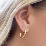 gold huggie with sapphires