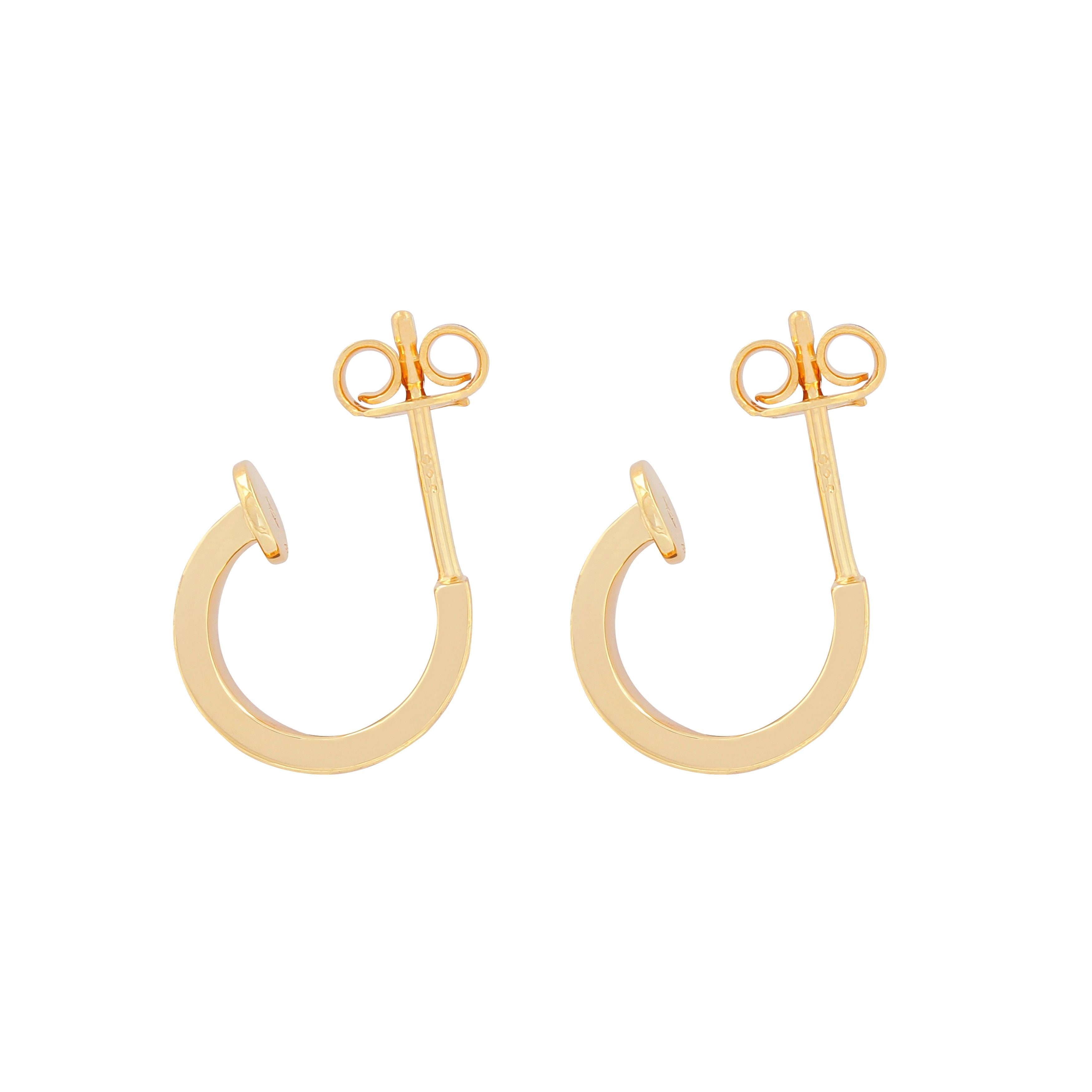 image of spark hoop enamel earrings showing side view lying flat on white background