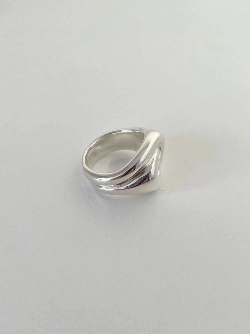 Ruddock-Ravel-riley-statement-cocktail-oversized-ring-fluid-interwoven-bold-chunky-pinky-signet-ring-sculptural-twist-sterling-Silver-demifine-contemporary-jewellery-golden