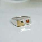 Tilly-Sudsbury-signet-ring-with-a-twist-orange-citrine-gemstone-rectangle-chunky-ring-statement-mixed-metal-gold-sterling-silver
