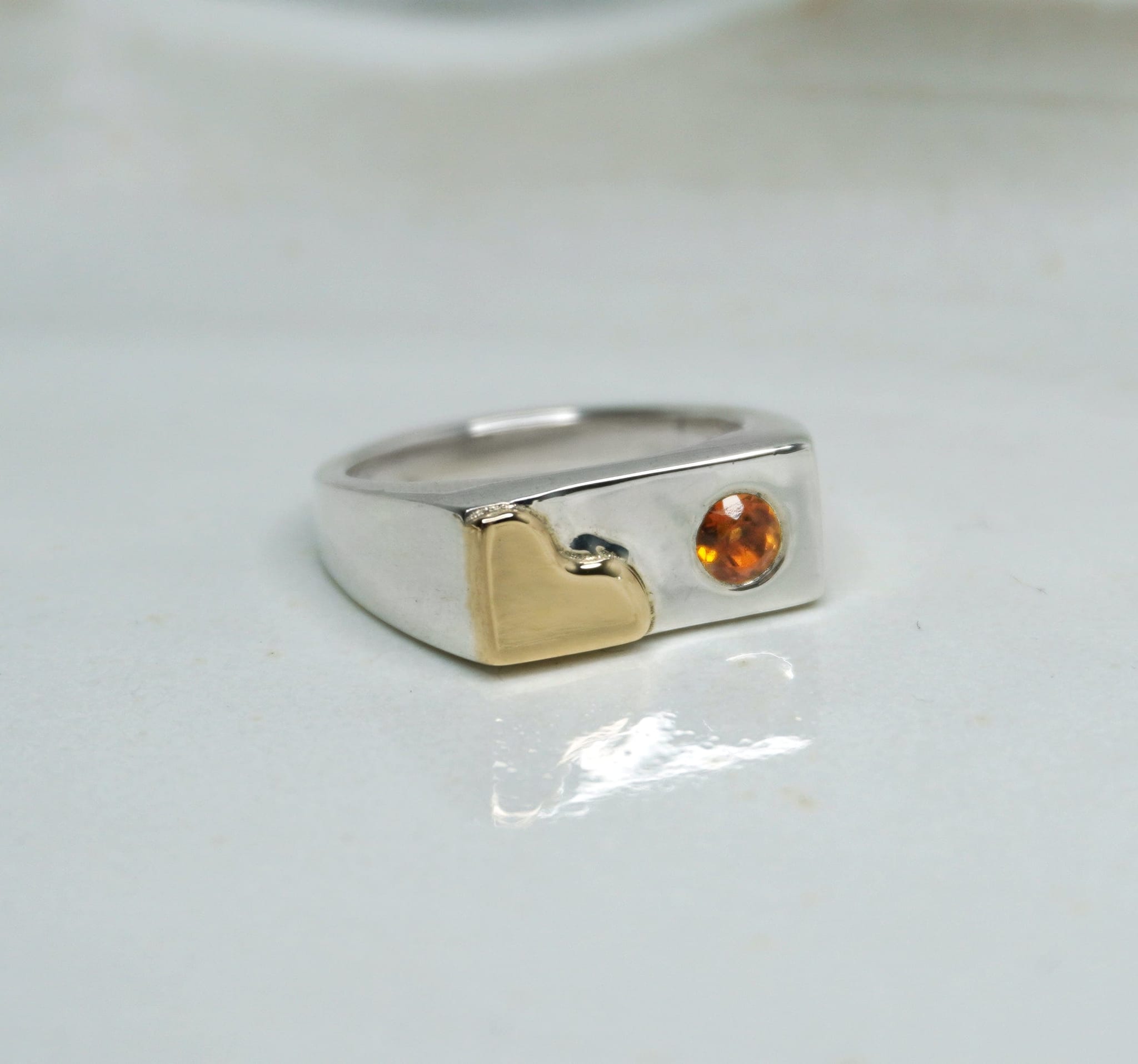 Tilly-Sudsbury-signet-ring-with-a-twist-orange-citrine-gemstone-rectangle-chunky-ring-statement-mixed-metal-gold-sterling-silver