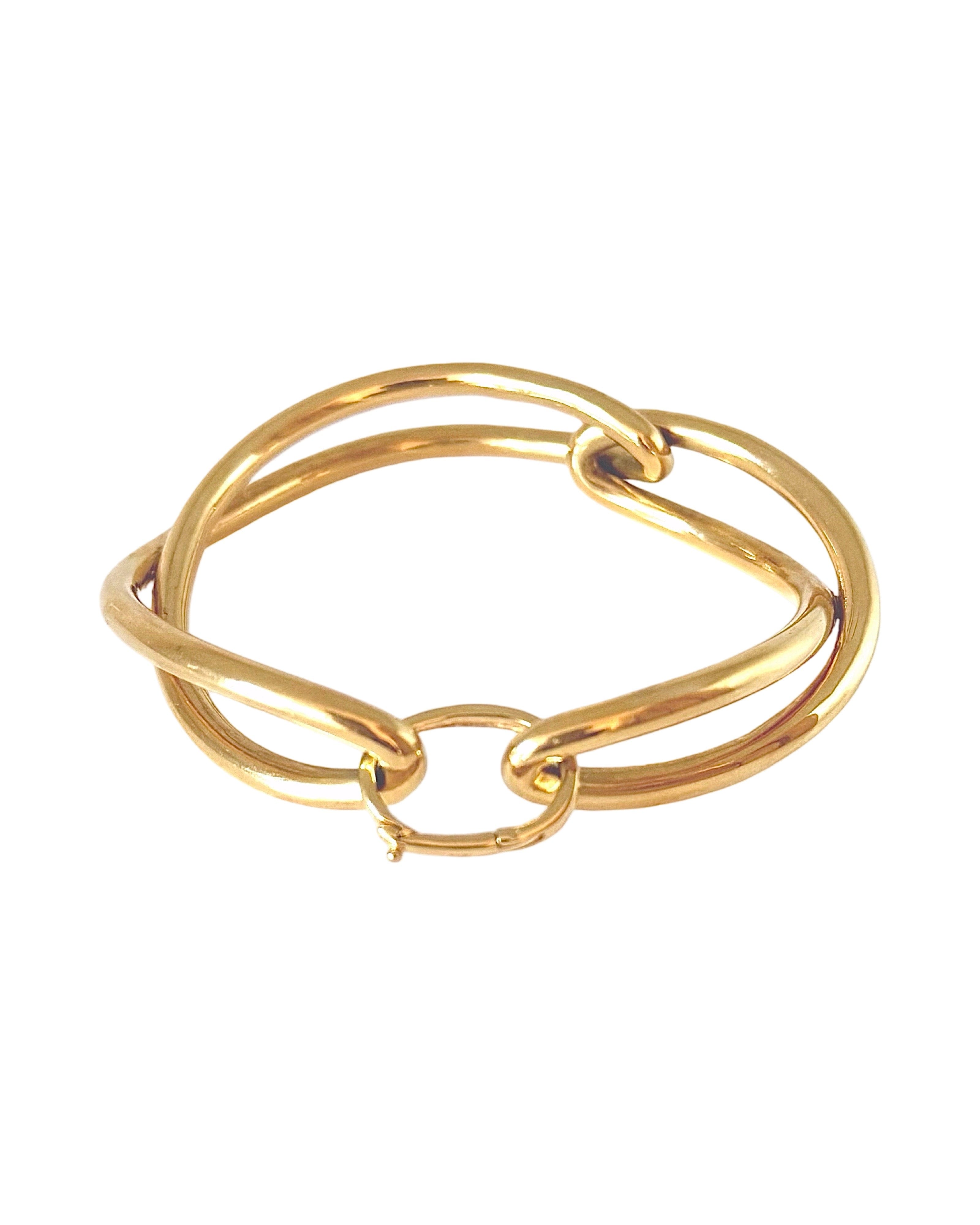 Ruddock-Soma-Bangle-Cuff-Interlocking-Interwoven-Tublar-Scultpural-twisted-clean-lines-forms-modern-statement-bracelet-Sleek-minimal-cool-jewellery-demifine-gold-plated-18ct