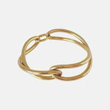 Ruddock-Soma-Bangle-Cuff-Interlocking-Interwoven-Tublar-Scultpural-twisted-clean-lines-forms-modern-statement-bracelet-Sleek-minimal-cool-jewellery-demifine-gold-plated-18ct