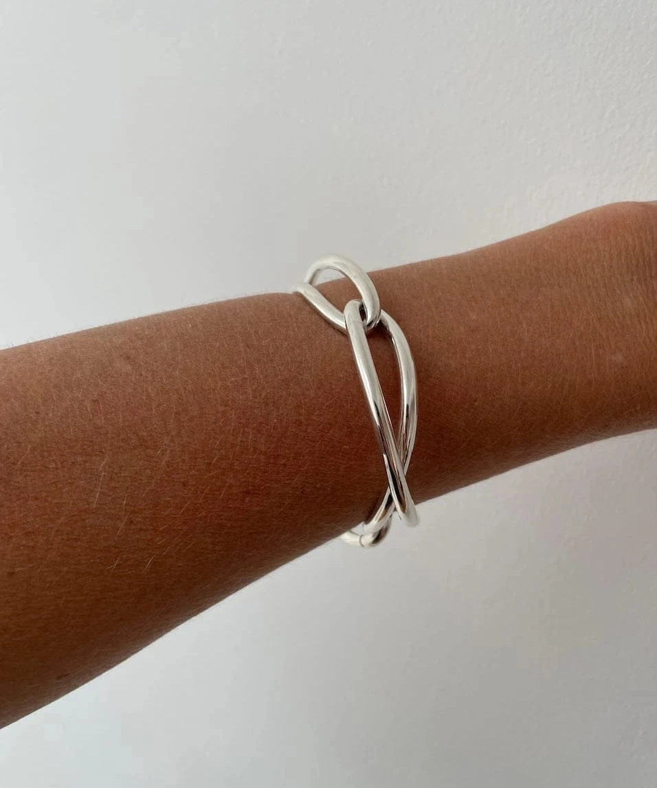 Ruddock-Soma-Bangle-Cuff-Interlocking-Interwoven-Tublar-Scultpural-twisted-clean-lines-forms-modern-statement-bracelet-Sleek-minimal-cool-jewellery-demifine-sterling-silver-solid