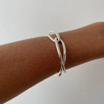 Ruddock-Soma-Bangle-Cuff-Interlocking-Interwoven-Tublar-Scultpural-twisted-clean-lines-forms-modern-statement-bracelet-Sleek-minimal-cool-jewellery-demifine-sterling-silver-solid