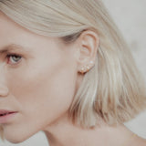 The Curve Gold Studs - Golden