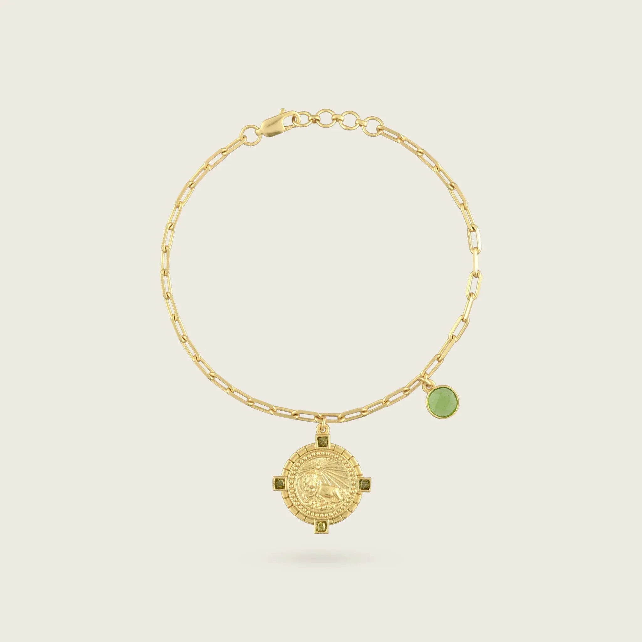 the-leo-zodiac-bracelet-kensho-heirlooms-18ct-gold-vermeil-chain-vintagestyle-antique-coin-amulet-engraved-peridot-birthstone-green-stone-personal-star-sign-gift-boho-winter-sun-jewellery-uk-brand-golden-Kensho Heirlooms-GOLDEN-ShopGolden.co-Demifine-Jewellery-Destination-Contemporary-Curated-UK-Brands