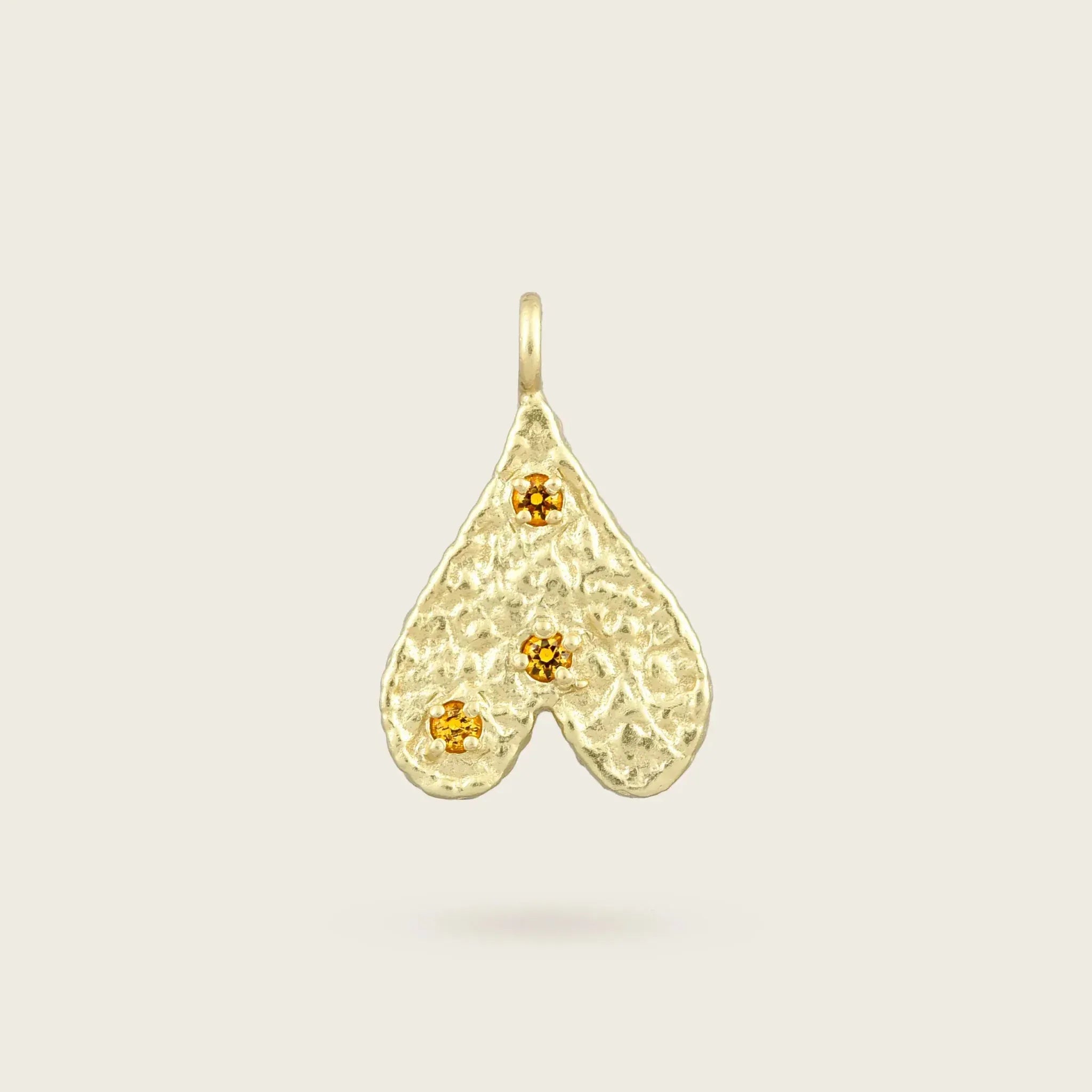 The Origins of Love Gold Charm-heart-citrine-stone-yellow-hammered-pendant-gold-vermeil-cool-boho-interchangable-mix-match-pendant-charm-necklace-layering-Kensho-Heirlooms-Summer-jewellery-handmade-uk-golden-brandsCharms-Kensho Heirlooms-GOLDEN-ShopGolden.co-Demifine-Jewellery-Destination-Contemporary-Curated-UK-Brands
