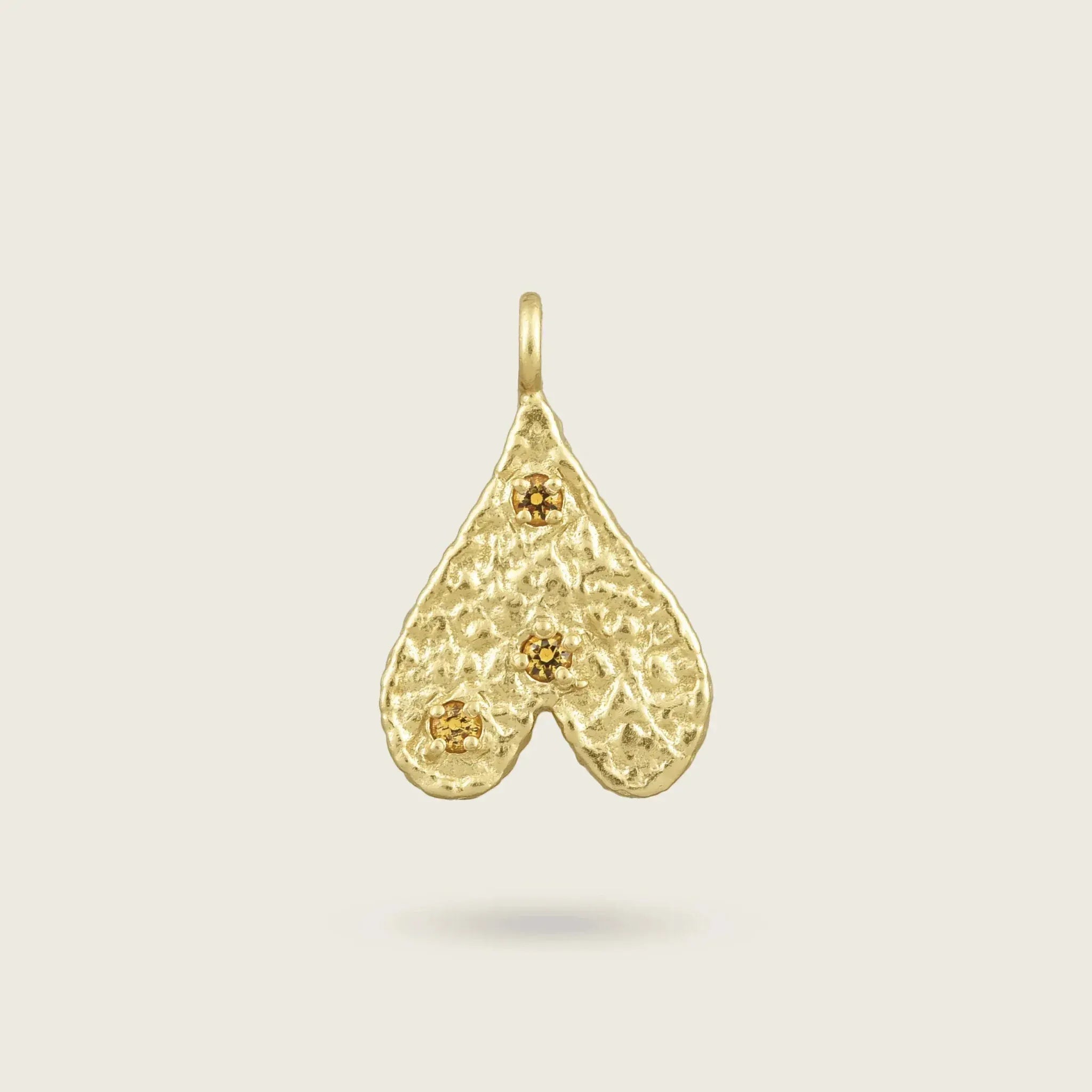 The Origins of Love Gold Charm-heart-citrine-stone-yellow-hammered-pendant-gold-vermeil-cool-boho-interchangable-mix-match-pendant-charm-necklace-layering-Kensho-Heirlooms-Summer-jewellery-handmade-uk-golden-brandsCharms-Kensho Heirlooms-GOLDEN-ShopGolden.co-Demifine-Jewellery-Destination-Contemporary-Curated-UK-Brands