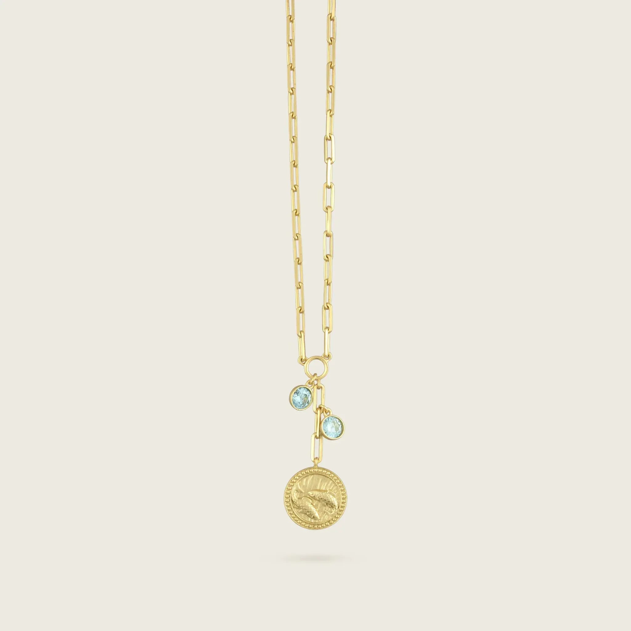 the-pisces-zodiac-amulet-necklace-kensho-heirlooms-statement-vintage-coin-design-chunky-pendant-aquamarine-charm-stones-cool-boho-winter-sun-jewellery-golden-demifine-destination-birthstone-zodiac-star-sign-contemporary-uk-brandsNecklace-Kensho Heirlooms-GOLDEN-ShopGolden.co-Demifine-Jewellery-Destination-Contemporary-Curated-UK-Brands