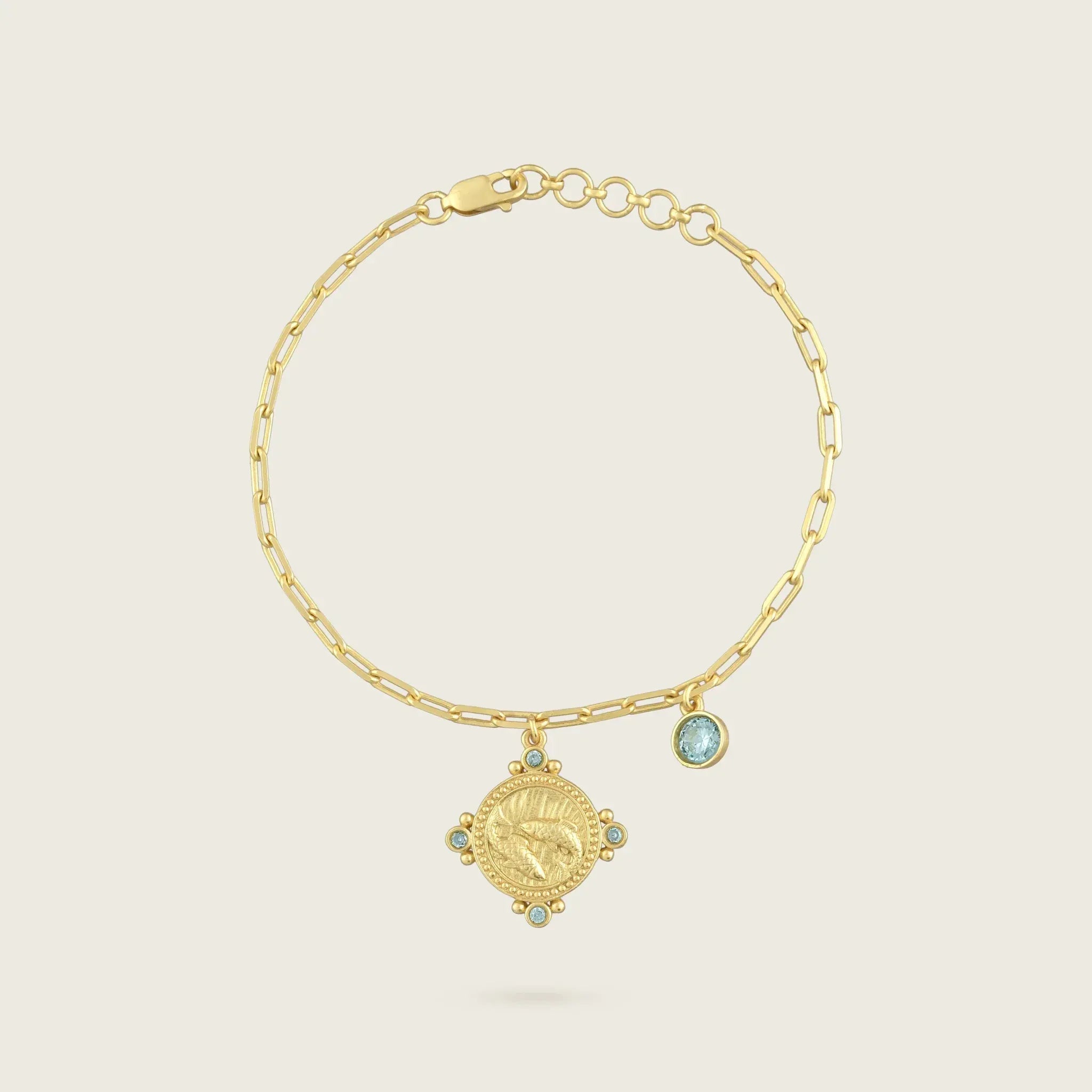 the-pisces-zodiac-bracelet-bangle-18ct-gold-vermeil-statement-cool-jewellery-vintage-antique-coin-charm-personal-star-sign-gift-everyday-meaningful-winter-sun-boho-uk-jewellery-brand-curated-at-golden-aquamarine-blue-turquoise-green-birthstone-Kensho Heirlooms-GOLDEN-ShopGolden.co-Demifine-Jewellery-Destination-Contemporary-Curated-UK-Brands