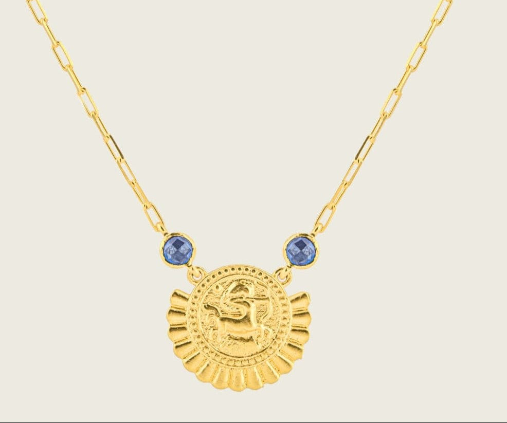 the-sagittarius-zodiac-amulet-single-necklace-blue-zircoin-stone-birthstone-vintage-coin-heirloom-boho-bohemian-cool-effortless-winter-sun-jewellery-demifine-golden-uk-brandsNecklaceNecklace-Kensho Heirlooms-GOLDEN-ShopGolden.co-Demifine-Jewellery-Destination-Contemporary-Curated-UK-Brands