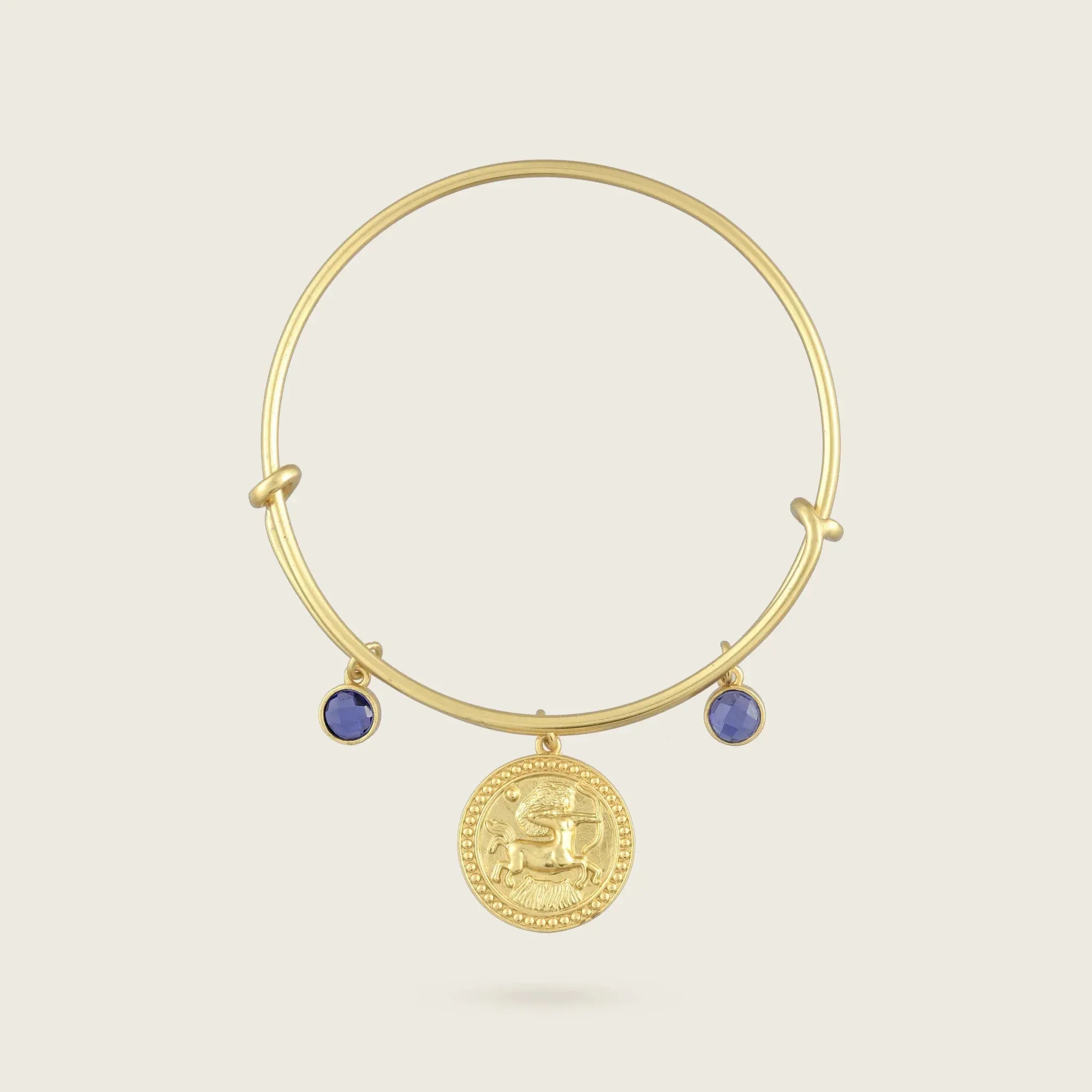the-sagittarius-zodiac-bracelet-bangle-18ct-gold-vermeil-statement-cool-jewellery-vintage-antique-coin-charm-blue-zircon-stone-birthstone-personal-star-sign-gift-everyday-meaningful-winter-sun-boho-uk-jewellery-brand-curated-at-goldenBracelets-Kensho Heirlooms-GOLDEN-ShopGolden.co-Demifine-Jewellery-Destination-Contemporary-Curated-UK-Brands