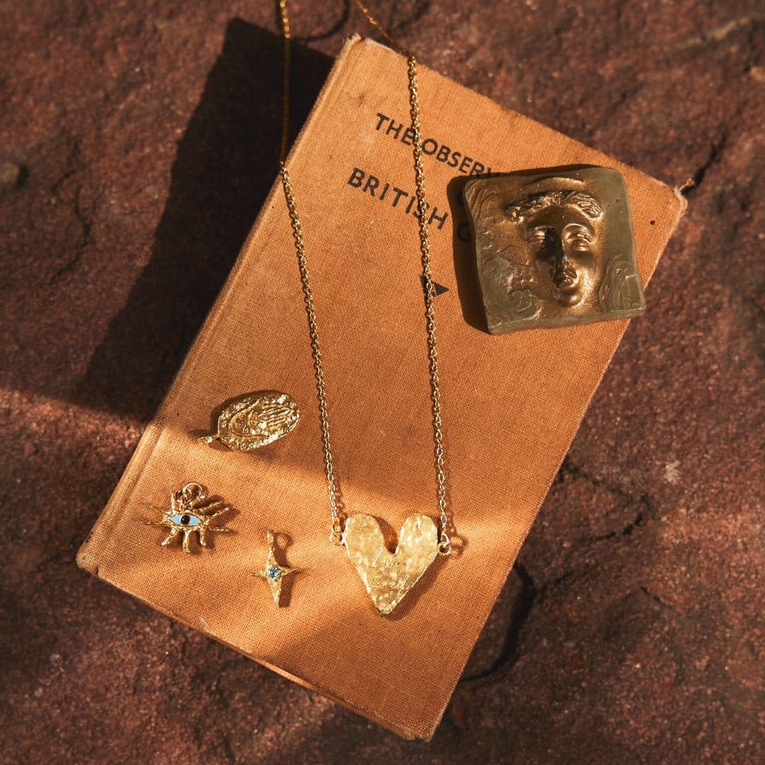 The Skycompass Charm-18ct-gold-vermeil-blue-topaz-star-cross-charm-pendant-interchangeable-boho-summer-winter-sun-pendant-necklace-hammered-Kensho-HeirloomsCharms-Kensho Heirlooms-GOLDEN-ShopGolden.co-Demifine-Jewellery-Destination-Contemporary-Curated-UK-Brands