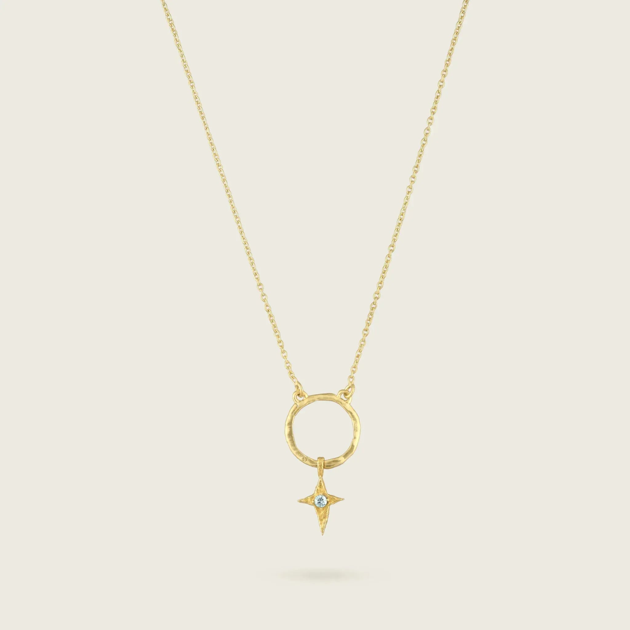 The Skycompass Charm-18ct-gold-vermeil-blue-topaz-star-cross-charm-pendant-interchangeable-boho-summer-winter-sun-pendant-necklace-hammered-Kensho-HeirloomsCharms-Kensho Heirlooms-GOLDEN-ShopGolden.co-Demifine-Jewellery-Destination-Contemporary-Curated-UK-Brands