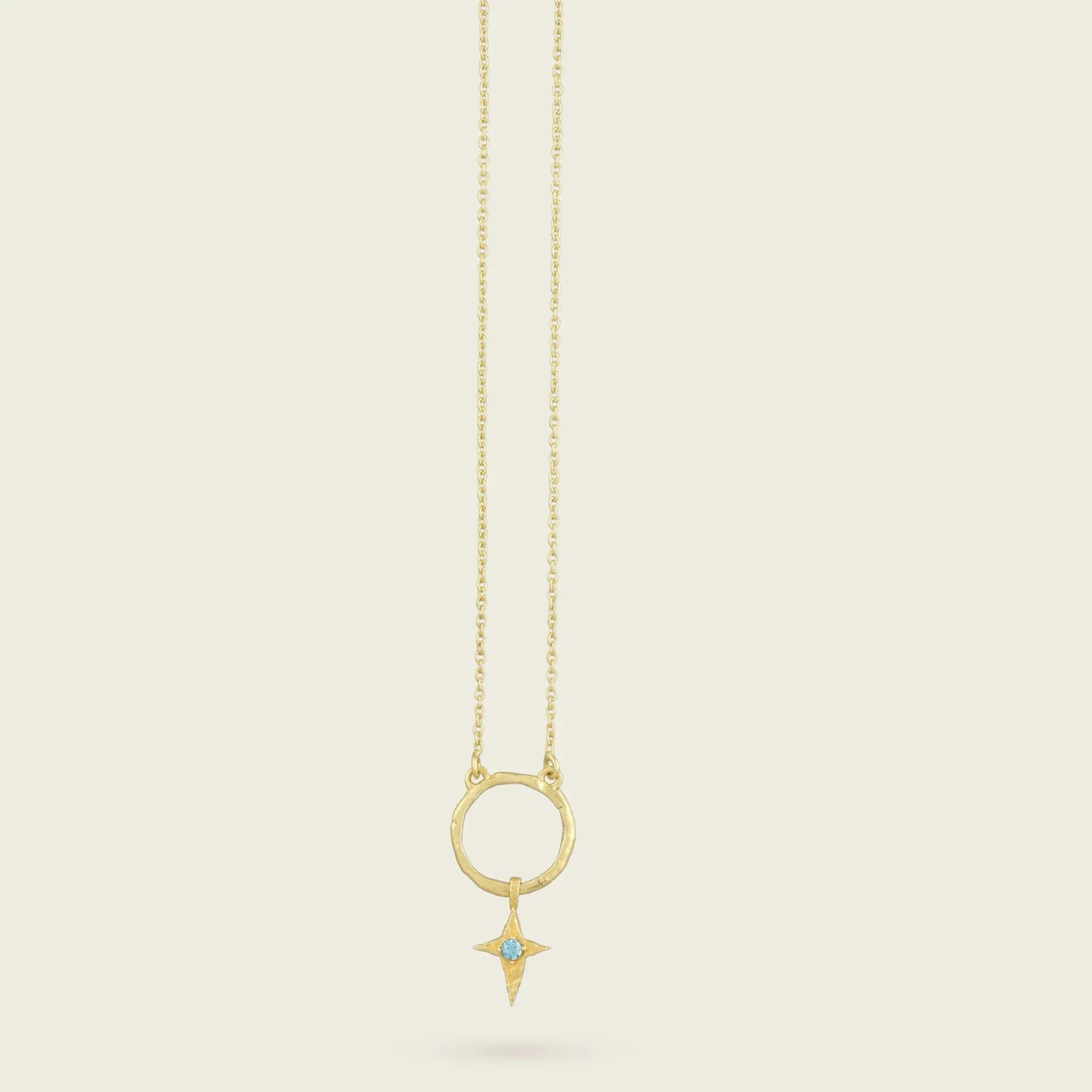 The Skycompass Charm-18ct-gold-vermeil-blue-topaz-star-cross-charm-pendant-interchangeable-boho-summer-winter-sun-pendant-necklace-hammered-Kensho-HeirloomsCharms-Kensho Heirlooms-GOLDEN-ShopGolden.co-Demifine-Jewellery-Destination-Contemporary-Curated-UK-Brands