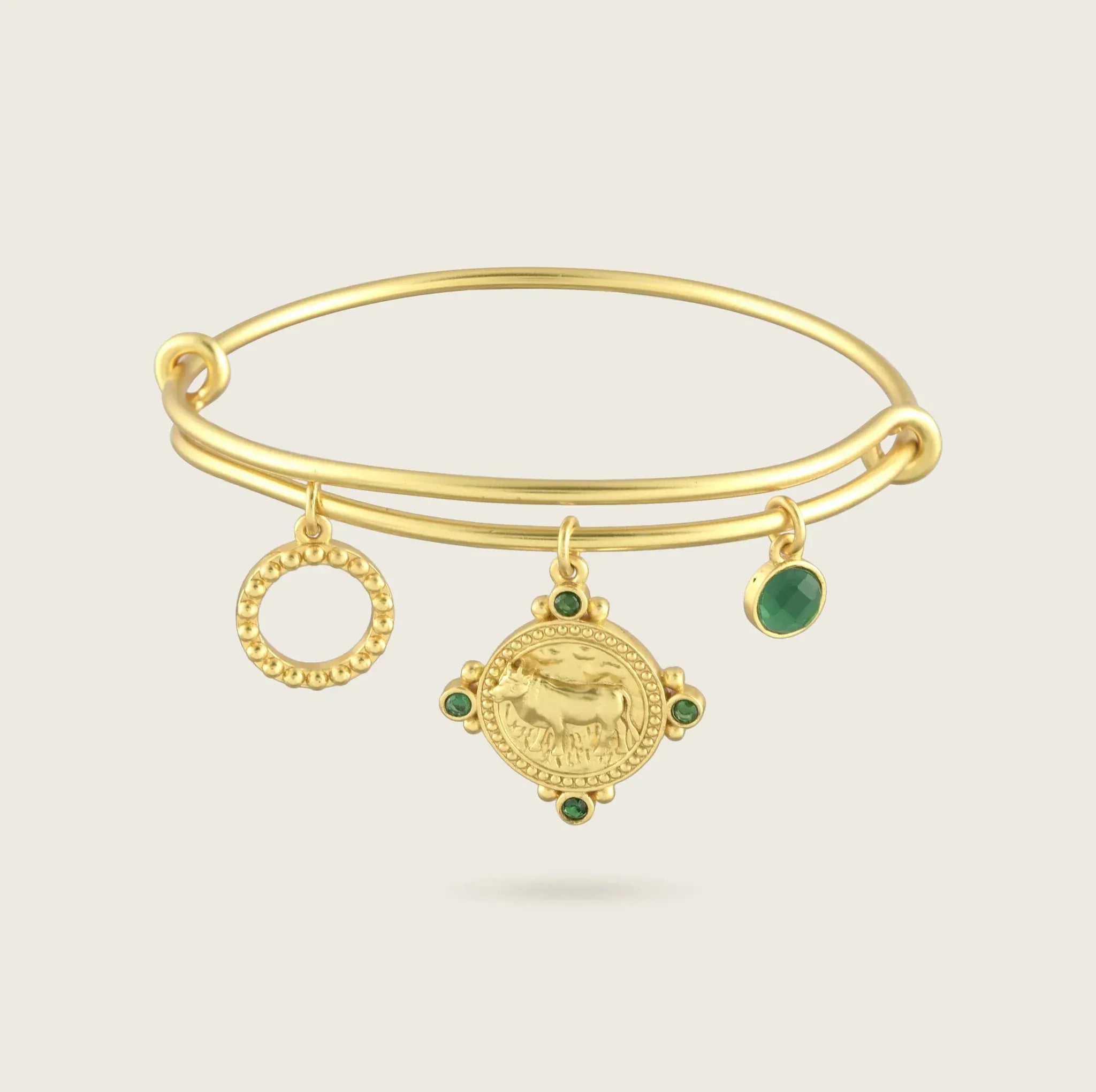 the-taurus-zodiac-bracelet-bangle-18ct-gold-vermeil-statement-cool-jewellery-vintage-antique-coin-charm-personal-star-sign-gift-everyday-meaningful-winter-sun-boho-uk-jewellery-brand-curated-at-golden-green-emerald-bangle-stoneBracelets-Kensho Heirlooms-GOLDEN-ShopGolden.co-Demifine-Jewellery-Destination-Contemporary-Curated-UK-Brands