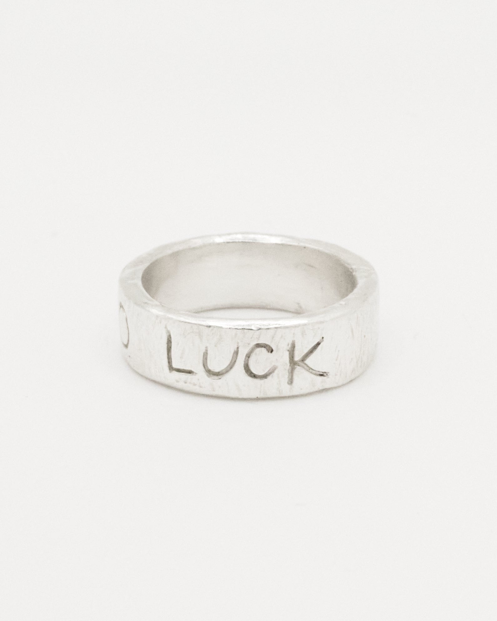 very-good-luck-ring-Keyes-engraved-band-chunky-wide-cigar-ring-lucky-charm-sterling-silver-handmade-london-cool-stacking-band-ring--GOLDEN-ShopGolden.co-Demifine-Jewellery-Destination-Contemporary-Curated-UK-Brands